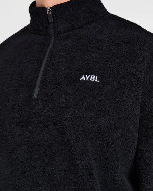 Essential 1/4 Zip Fleece - Black: The Ultimate Oversized Warmth Solution