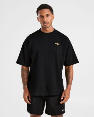 Essential Oversized T Shirt - Black/Mango Yellow: The Ultimate Comfort Upgrade