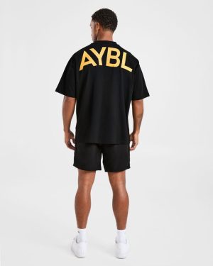 Essential Oversized T Shirt - Black/Mango Yellow: The Ultimate Comfort Upgrade