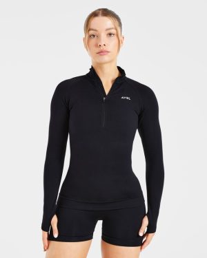 Essential Seamless 1/2 Zip Pullover - Black: The Ultimate Sculpting Layer