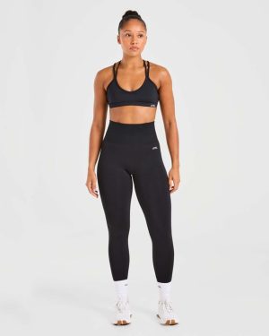 Essential Strappy Sports Bra - Black: The Ultimate Low-Impact Companion