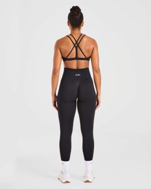 Essential Strappy Sports Bra - Black: The Ultimate Low-Impact Companion
