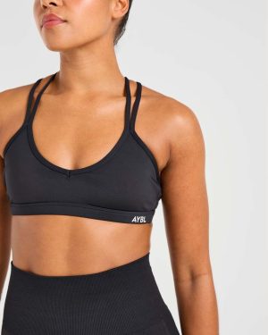 Essential Strappy Sports Bra - Black: The Ultimate Low-Impact Companion