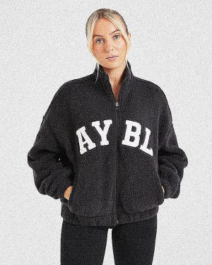 Ultimate Comfort: Varsity Oversized Fleece Zip Up Jacket in Black