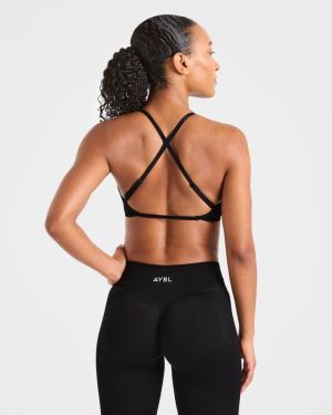 Adapt Seamless Strappy Sports Bra - Black: The Ultimate Low-Impact Companion